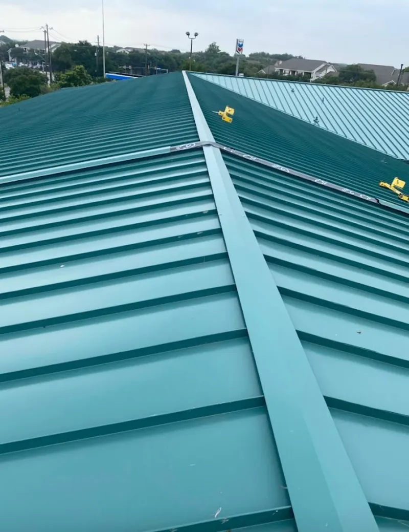 Green commercial metal roof ridge and valley for Metal Roof Repair in Seagoville