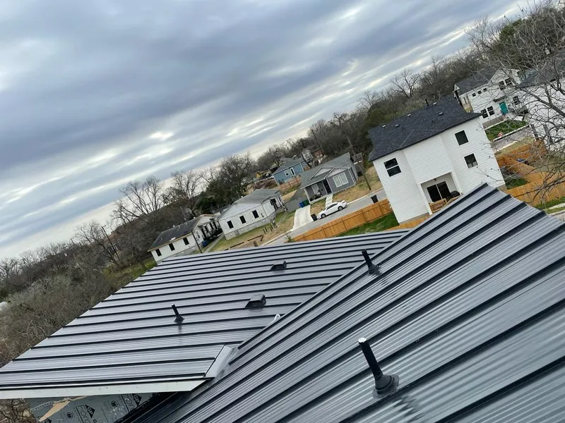 Standing seam metal roof panels with vents for Skylight Repair in Seagoville